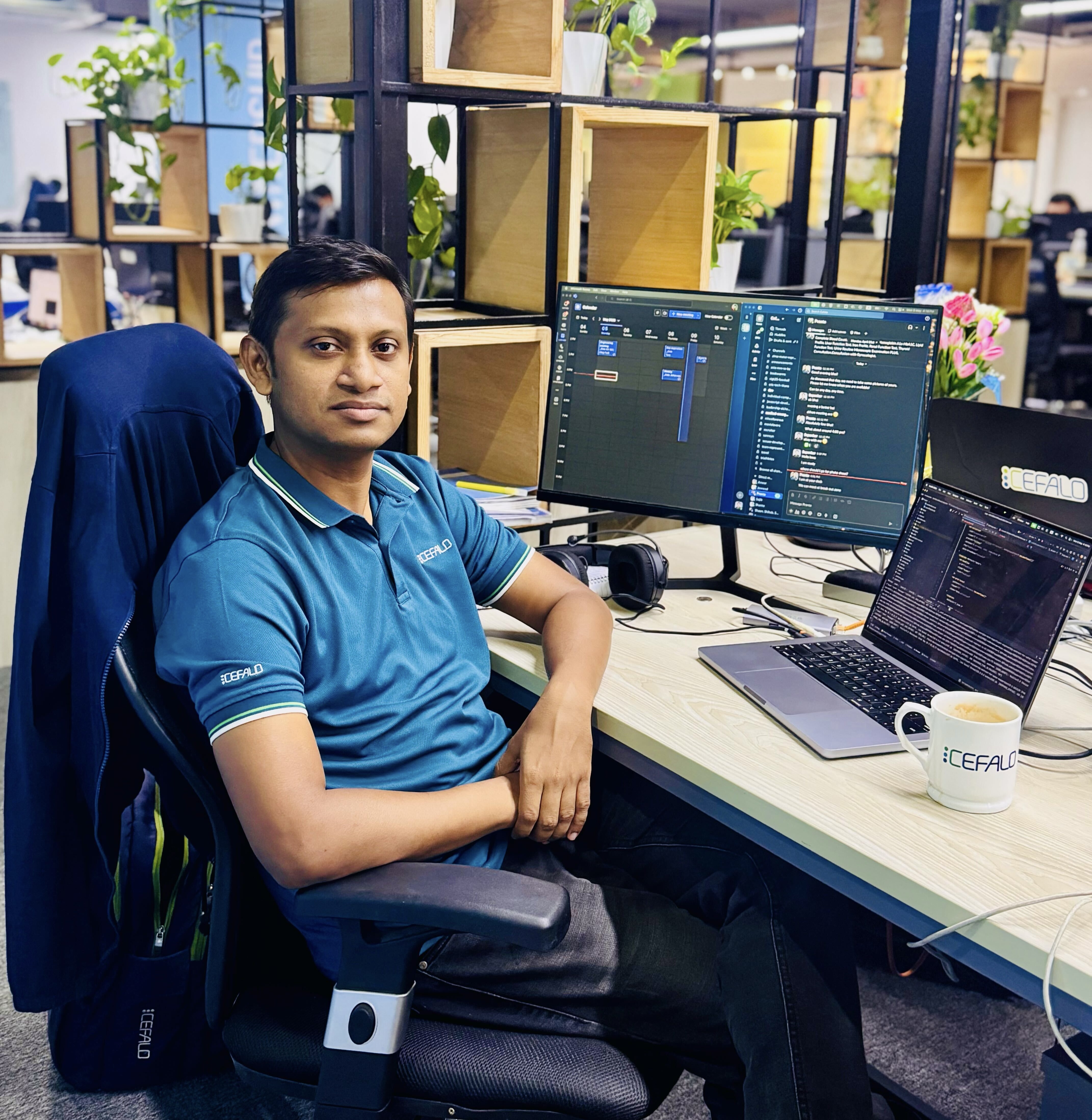 Supankar Banik from Cefalo sitting at his desk in the office